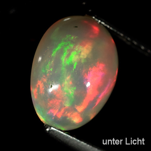 Bild 1 von 3.26 ct.! Enchanting oval 11 x 8.5 mm Multicolor Ethiopia Opal