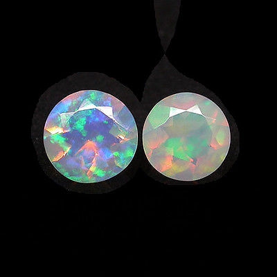 Bild 1 von 1.57 ct  Feines Paar runde facett. Multi-Color Welo Opale mit tollem Flash