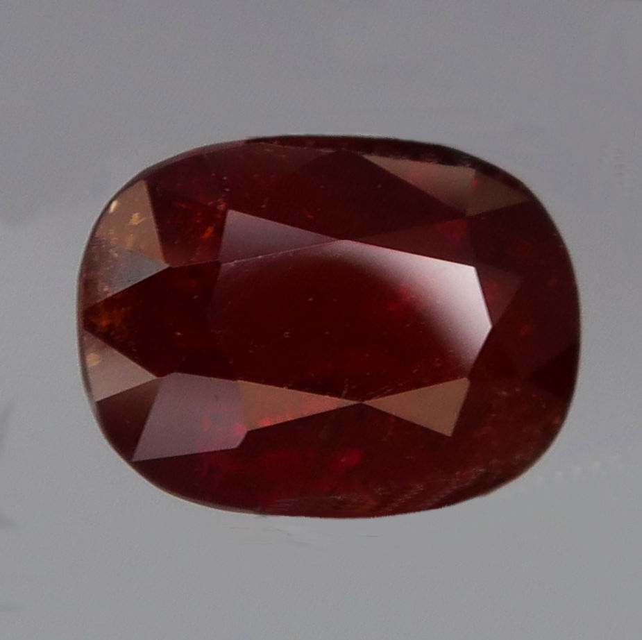 Bild 1 von 6.75 ct. Orange-roter ovaler 12 x 8.7 mm Spessartin Granat