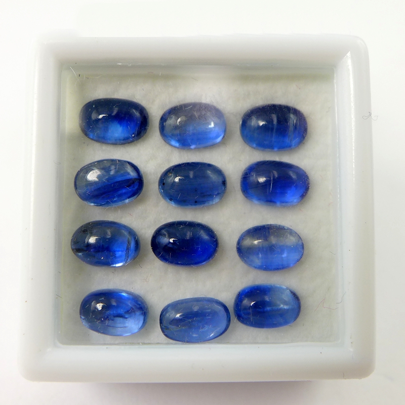 Bild 1 von 8.67 ct. 12 pieces oval Blue 5.8 x 3.8 - 6 x 4.1 mm Nepal Cabochon Kyanite
