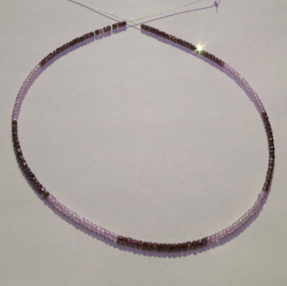 Bild 1 von Bicolor Saphire string red and orange 72 ct with circular disks Ø 3 mm 40 cm length