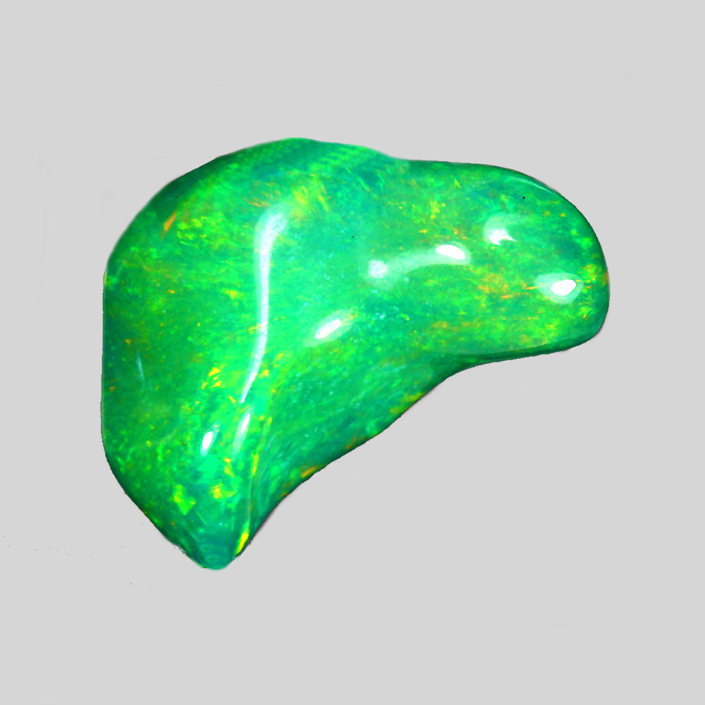 Bild 1 von 3.8 ct. Pad green sparkling 15 x 9 mm Ethiopian Opal Cabochon 
