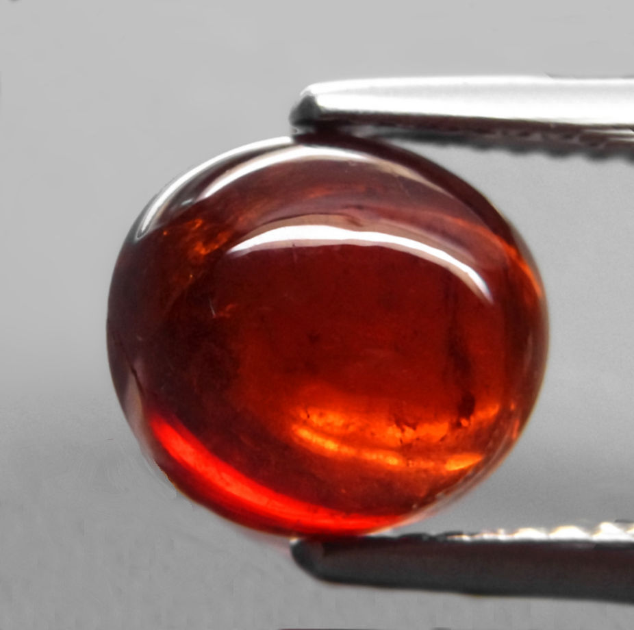 Bild 1 von 2.25 ct. Toller orangeroter ovaler 9 x 8.2 mm Spessartin Granat Cabochon