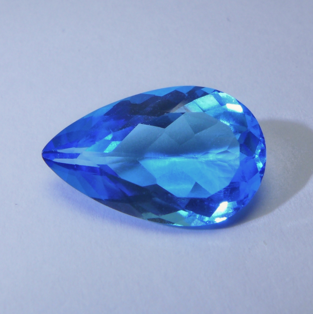 Bild 1 von 7.20 ct.  Feiner 16.7 x 10.3 mm Brasilien Swiss Blue Topas Tropfen