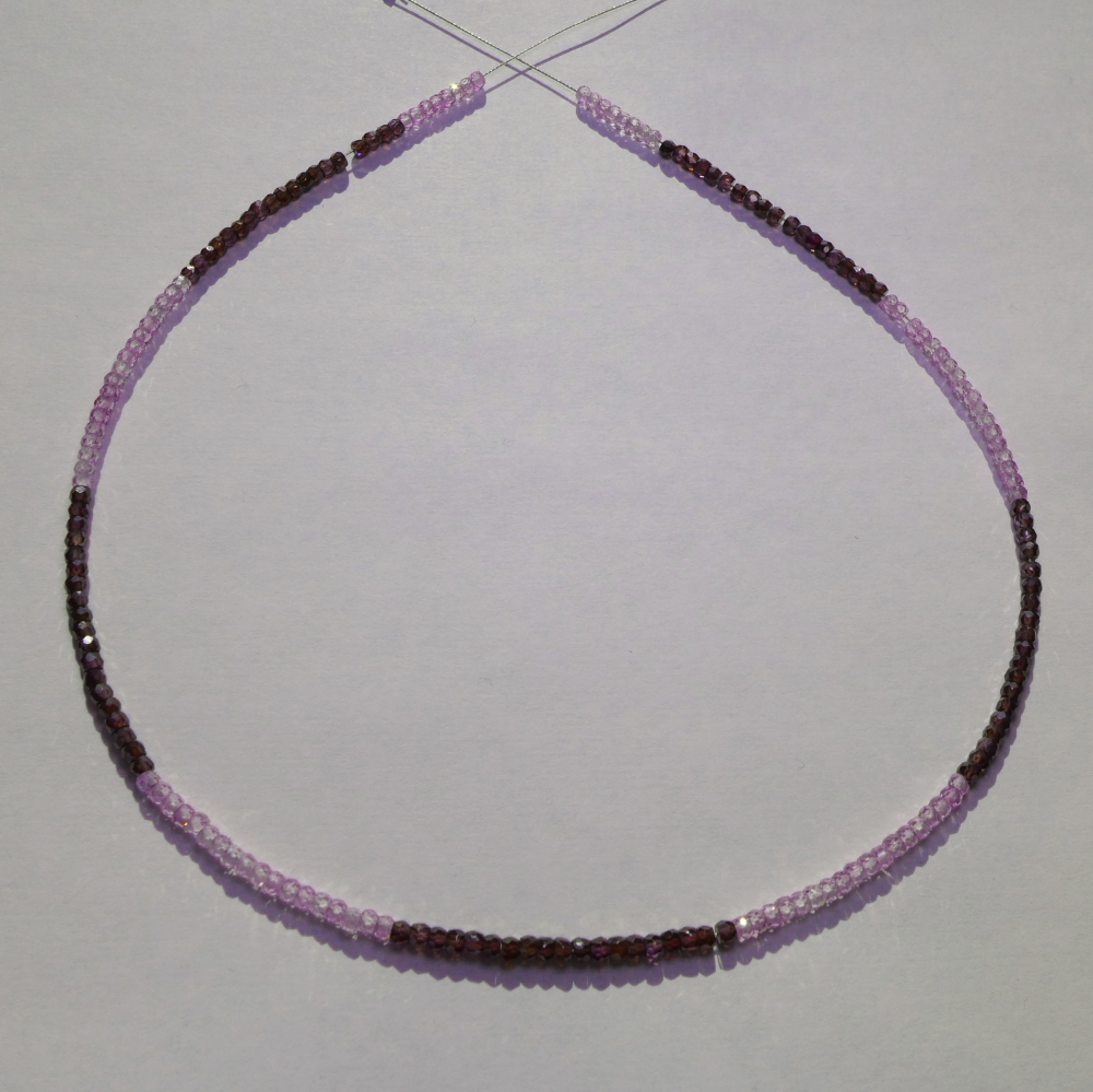 Bild 1 von Bicolor Saphire string red and orange 74 ct with circular disks Ø 3 mm 42 cm length