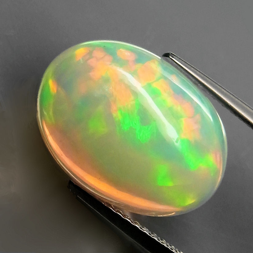 Bild 1 von 6.90 ct ! Ravishing  Rainbow Color Oval 16.6 x 12 mm Opal Ethiopia
