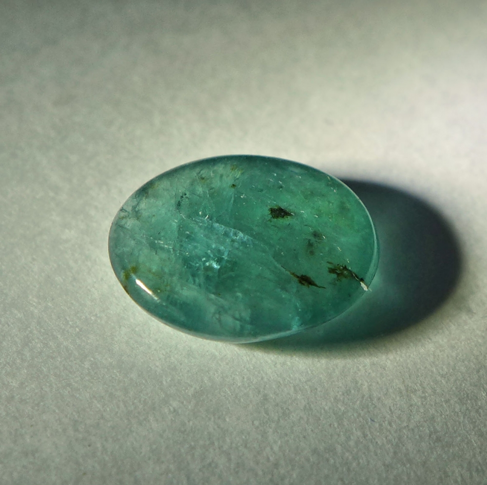 Bild 1 von 2.63 ct Grüner ovaler 10.6 x 8.7 mm Afrika Grandidierit Cabochon