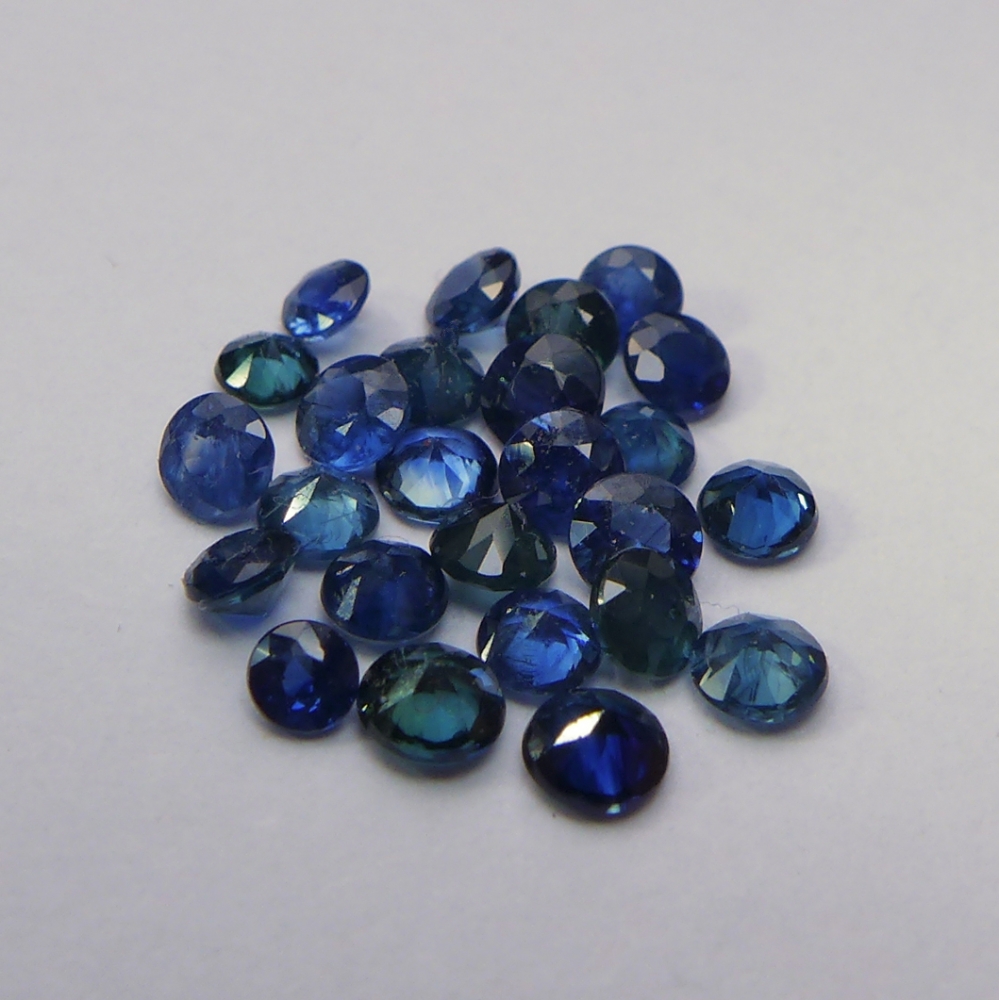 Bild 1 von 2.06 ct. 25 Stück runde dunkelblaue 2.3 - 2.8 mm Madagaskar Saphire