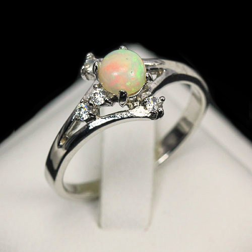 Bild 1 von Feiner 925 Silber Ring mit echtem Welo Opal GR 54,5