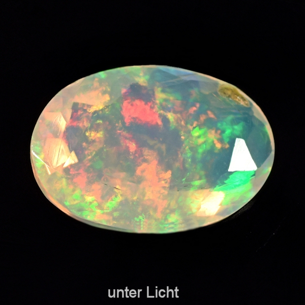 Bild 1 von 1.06 ct.! Ovale untreated faceted 9.3 x 6.5 mm Multi-Color Ethiopia Opal