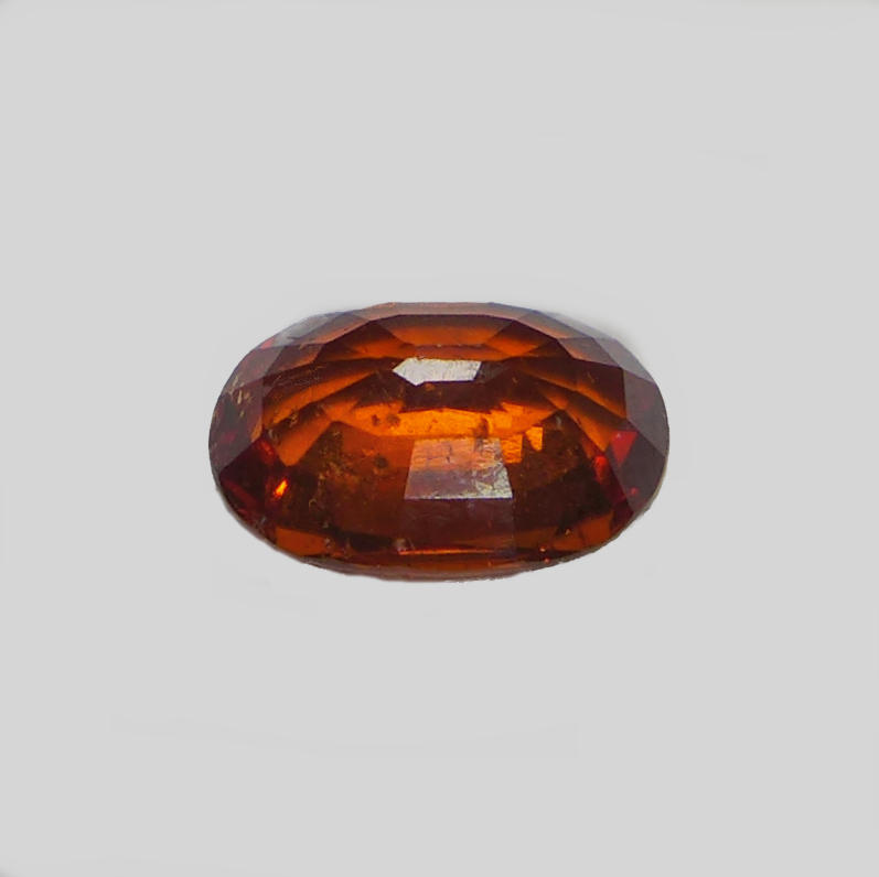 Bild 1 von 2.00 ct. Orangeroter ovaler 8.8 x 6 mm Spessartin Granat