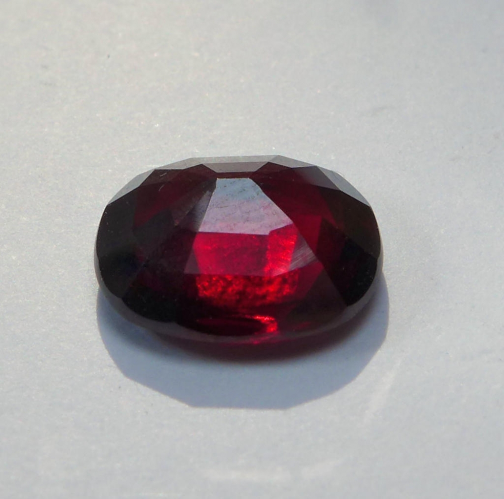 Bild 1 von 4.81 ct. Großer orangeroter 11.2 x 10.2mm Cushion Spessartin Granat