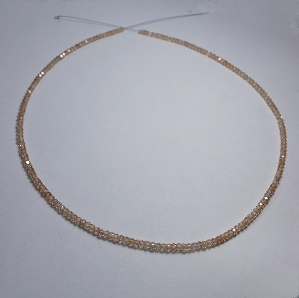 Bild 1 von Beiger Saphire string 71 ct with circular disks Ø 3 mm 42 cm length