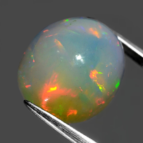 Bild 1 von 6.07 ct. Herrlicher großer 14.3 x 11.7 mm  Multi-Color Welo Opal