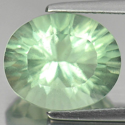 Bild 1 von  6.55 ct. VS! Oval Light Green 12.4 x 10.3 mm Brazil Fluorite