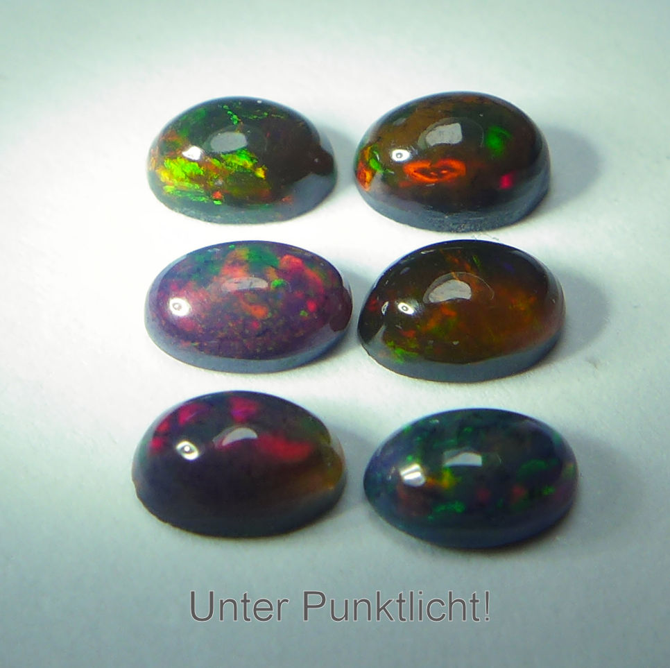 Bild 1 von 1.16 ct. 6  pieces of  black oval 5 x 3 mm Multi Color Opals