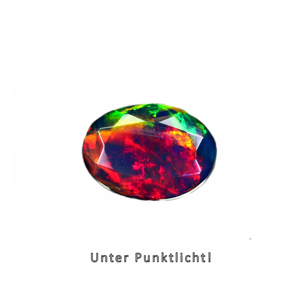 Bild 1 von 0.99 ct. Black faceted oval 9 x 6.5 mm Multi-Color Ethiopia Opal