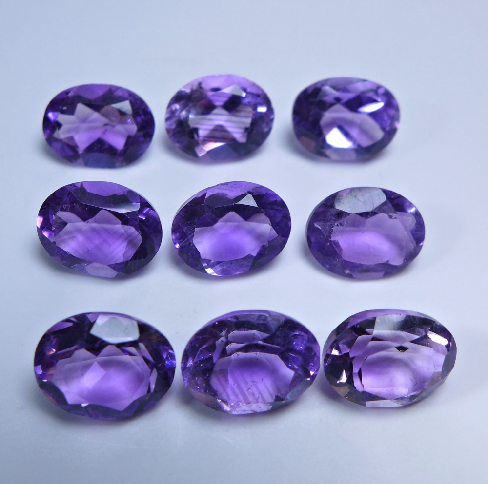 Bild 1 von 15.86 ct. 9 pieces fine oval 9 x 7 mm Bolivia Amethyst Gems