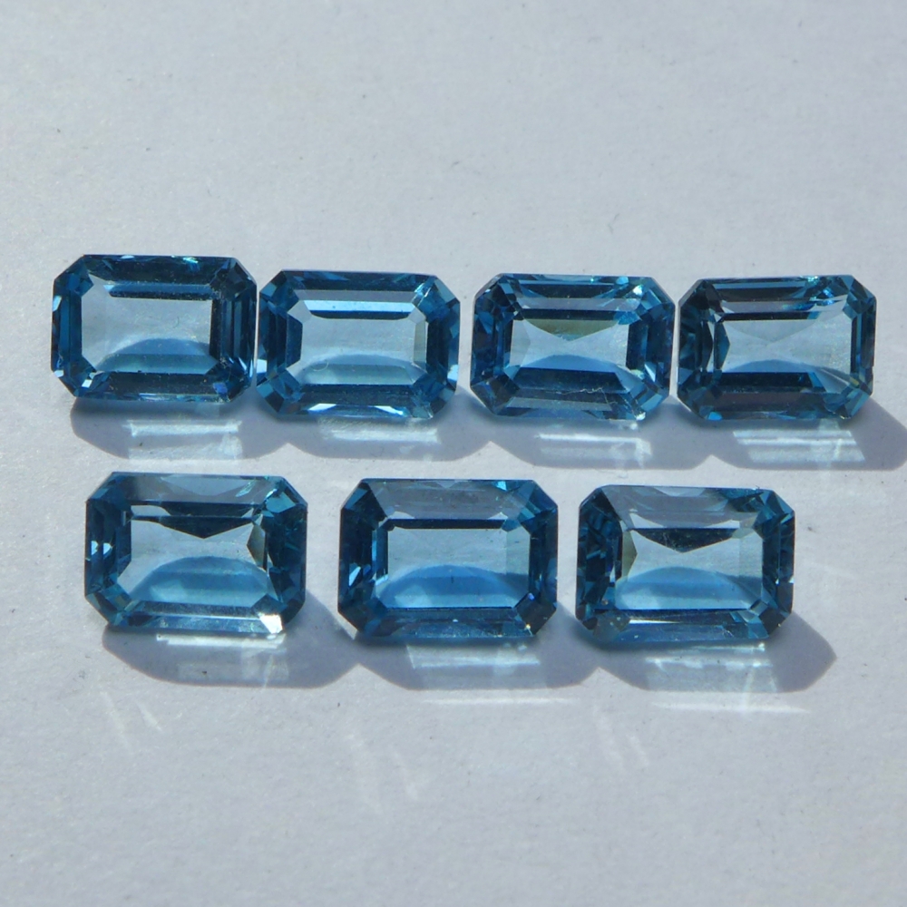 Bild 1 von 8.77 ct VS!  7 Stück 7 x 5 mm Brasilien London Blue Topas Baguettes
