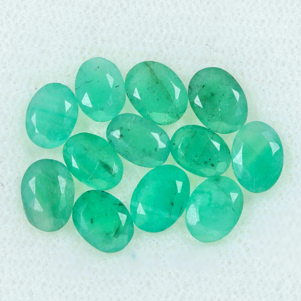 Bild 1 von 5.14 ct. 12 Stück ovale 6 x 4 mm Brasilien Smaragde