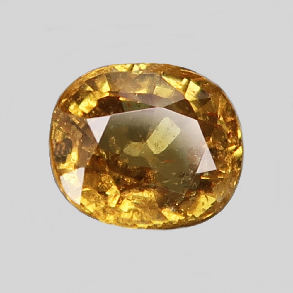 Bild 1 von 1.44 ct.Rare yellowish orange oval 6 x 7mm Malaya Garnet Gemstone