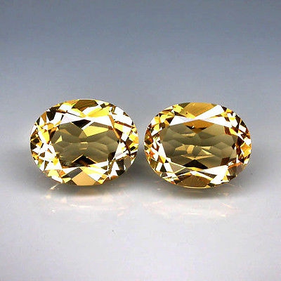 Bild 1 von 4.64 ct  Augenreines Paar Goldgelbe ovale 10 x 8 mm Brasilien Beryll Edelsteine