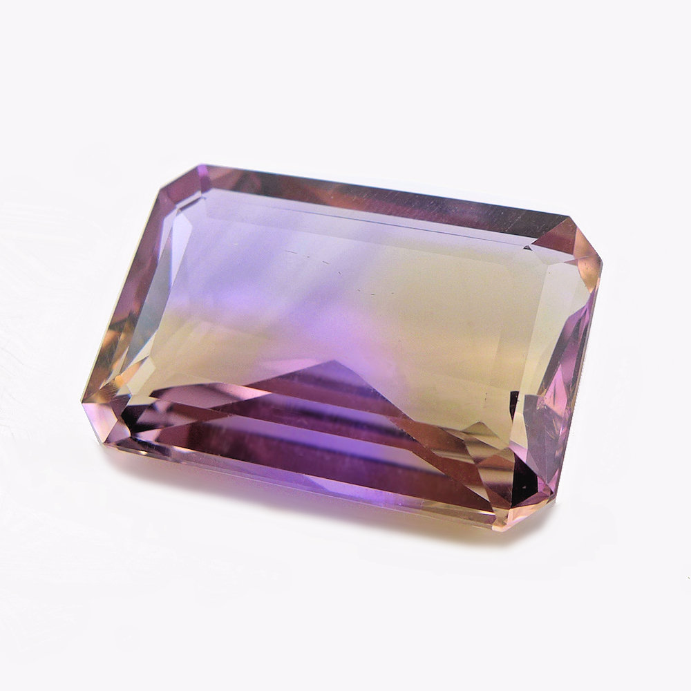 Bild 1 von  26,95 ct. Big nat. 24.1 x 16.2 mm Emerald Facet Bolivia Ametrine