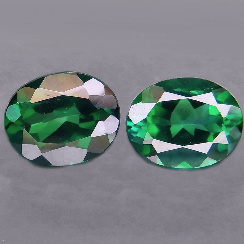 Bild 1 von 6.19 ct. VS! Feines Paar grüne ovale 10 x 8 mm Brasilien Topase