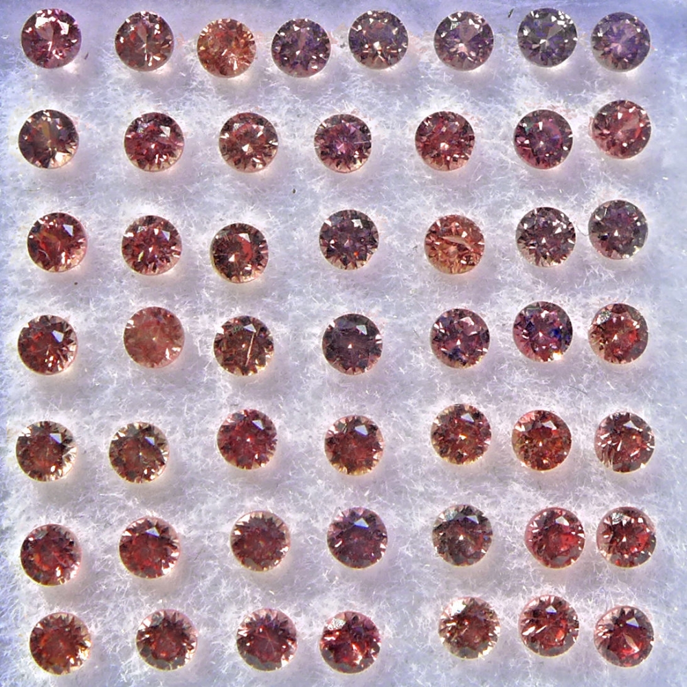 Bild 1 von 1.5 ct.  50 orange red round  1.7  mm Tansania Sapphires