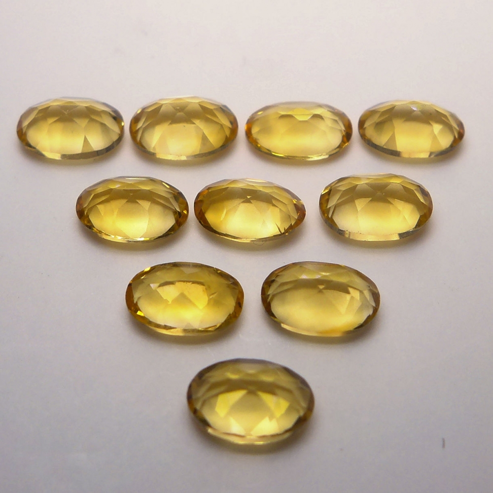 Bild 1 von 4.20 ct. 10 St. Augenreine ovale 6 x 4 mm Brasilien Citrine