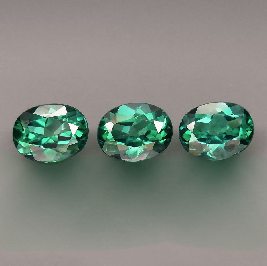 Bild 1 von 6.20 ct. VS! 3 ovale blau-grüne 9 x 7 mm Brasilien Topase