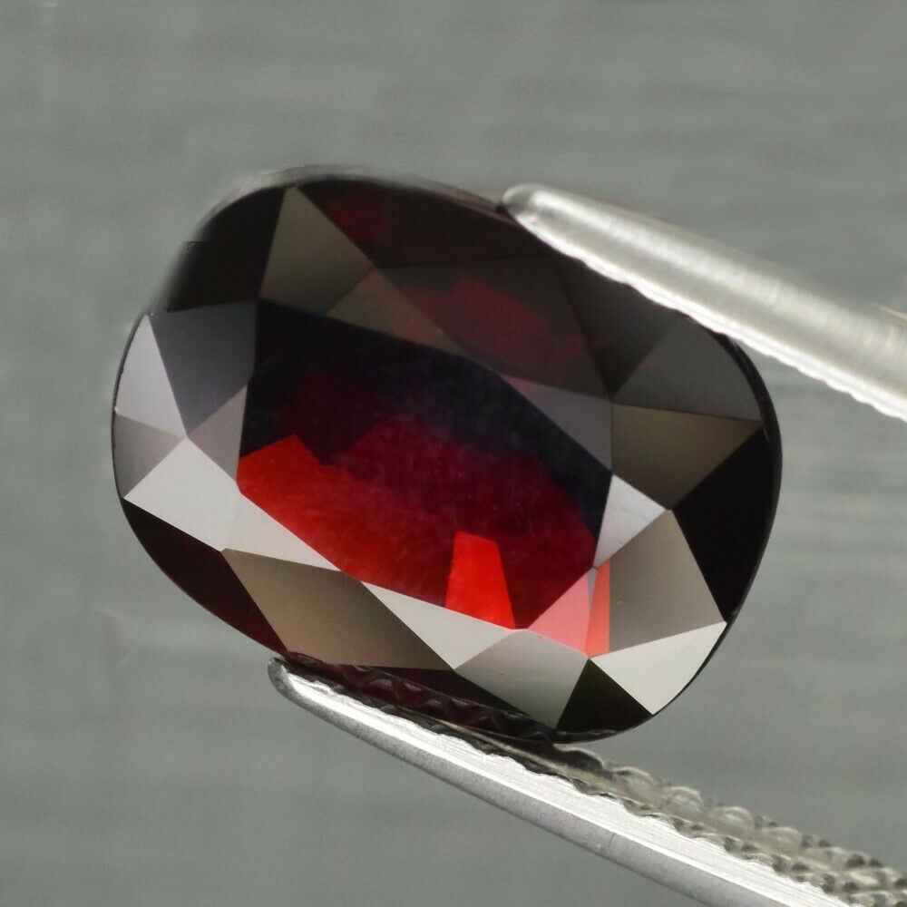 Bild 1 von 4.45 ct. IF! Orang-roter ovaler 10.2 x 8.3 mm Spessartin Granat