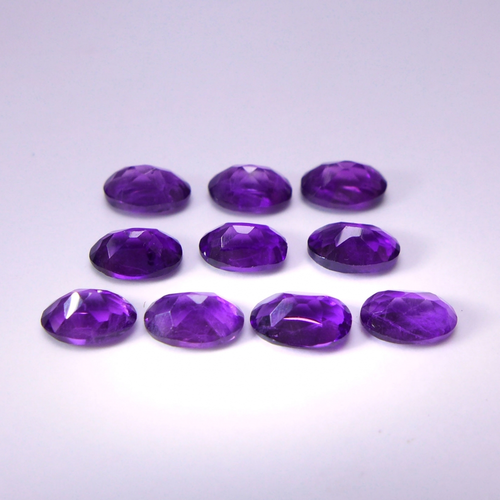 Bild 1 von 4.35 ct. 10 Stück ovale 6 x 4 mm Uruguay Amethyst Edelsteine