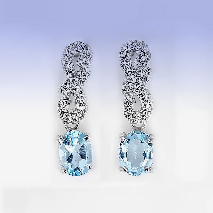 Bild 1 von 925 Silver Stud Earrings with genuine Sky Blue Topaz Gemstones