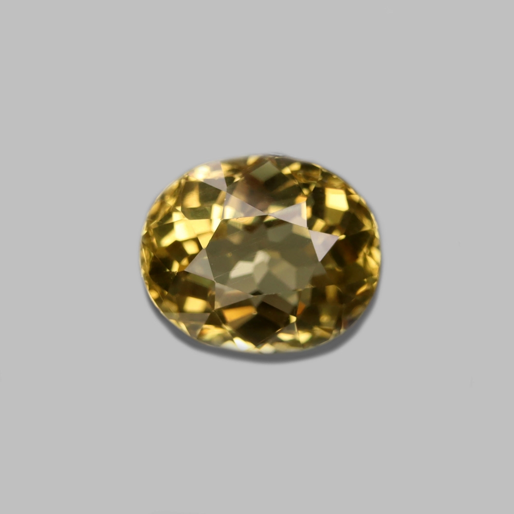Bild 1 von 3.00 ct. Sparkling yellow oval 9.7 x 8.1mm Brazil Apatite