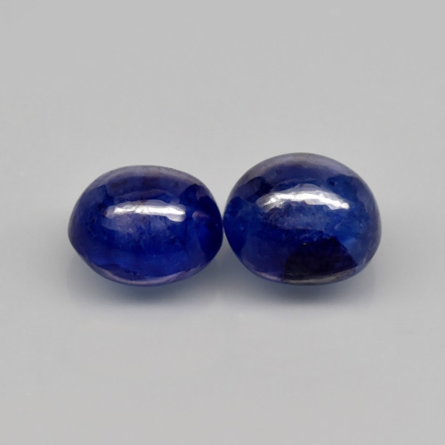 Bild 1 von 6.59 ct. Beautiful pair of oval dark blue Madagascar Cabochon Sapphire