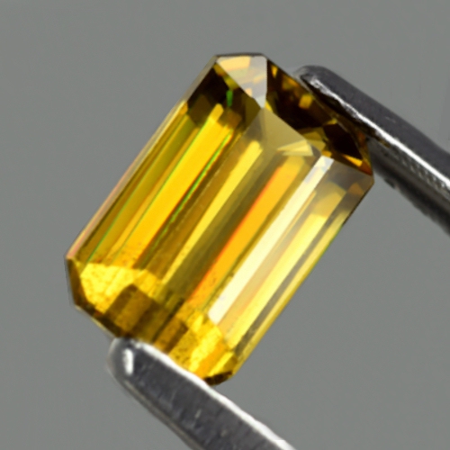 Bild 1 von 0.86 ct.  Unbehandelter grünlich Gelber 6.7 x 4 mm Madagaskar Titanit Sphen