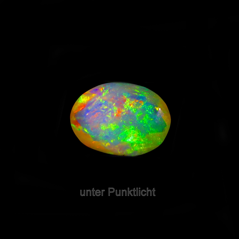 Bild 1 von 1.85 ct.  Natürlicher  facett. ovaler 10.5 x 7.7 mm Multi-Color Äthiopien Opal