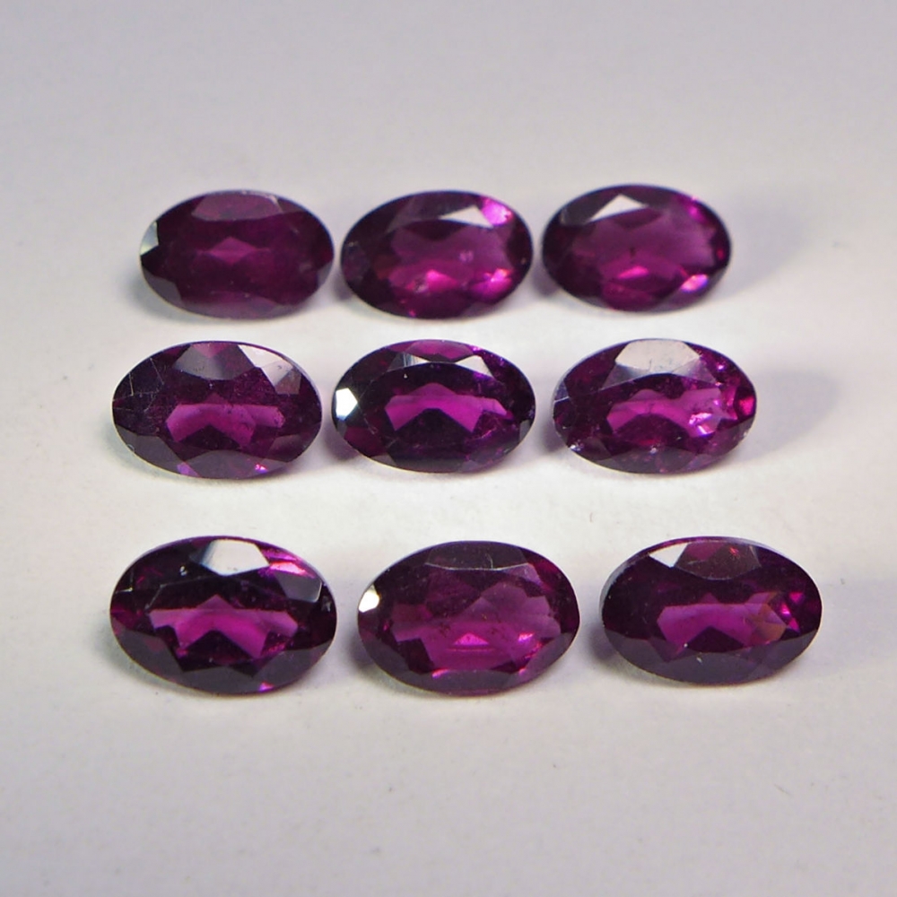 Bild 1 von 4.86 ct. 9 pieces eye clean pink- violet 6 x 4 mm Rhodolite Garnet Gems. Ravashing color!