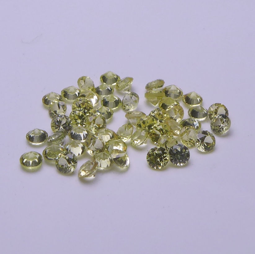 Bild 1 von 0.90 ct 50 pieces green- yellow 1.6 mm Brilliant Cut Madagascar Sapphires