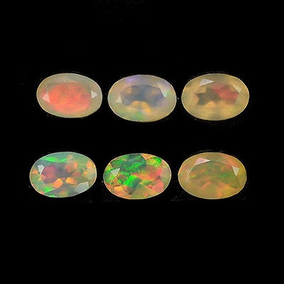 Bild 1 von 2.19 ct  6 St. feine ovale facett. Multi-Color Yita Ridge Opale mit tollem Flash