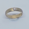 Bild 1 von 585 Gelbgoldring mit Brillant, 0.06 ct,  in Weißgold- Zargenfassung