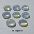 Bild 1 von 4.44 ct. 8 Stück weiße  ovale 7 x 5 mm Multi-Color Äthiopien Opal Cabochons