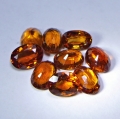 Bild 2 von 6.05 ct. 9  Stück orangerote ovale 6 x 4.5 mm Spessartin Granate