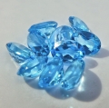 Bild 2 von 9.40 ct.  10 Stück ovale 5 x 7 mm Brasilien Sky Blue Topas Edelsteine