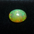 Bild 1 von 1.24 ct. Noble ovale 9 x 8 mm Ethiopian Multi Color Opal