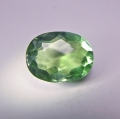 Bild 1 von 6.16 ct. Untreated green oval 13.6 x 10.4 mm Brazil Apatite