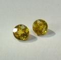 1.37 ct. Schönes  Paar runde grünlich gelbe 5.1 mm Madagaskar Titanit Sphen