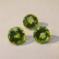 Bild 1 von 3.66 ct. 3 pieces round green 6.5 mm Peridot Gemstones. Nice color !
