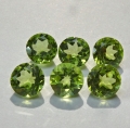 3.21 ct. 6 pieces round green 5 mm Peridot Gemstones. Nice color !
